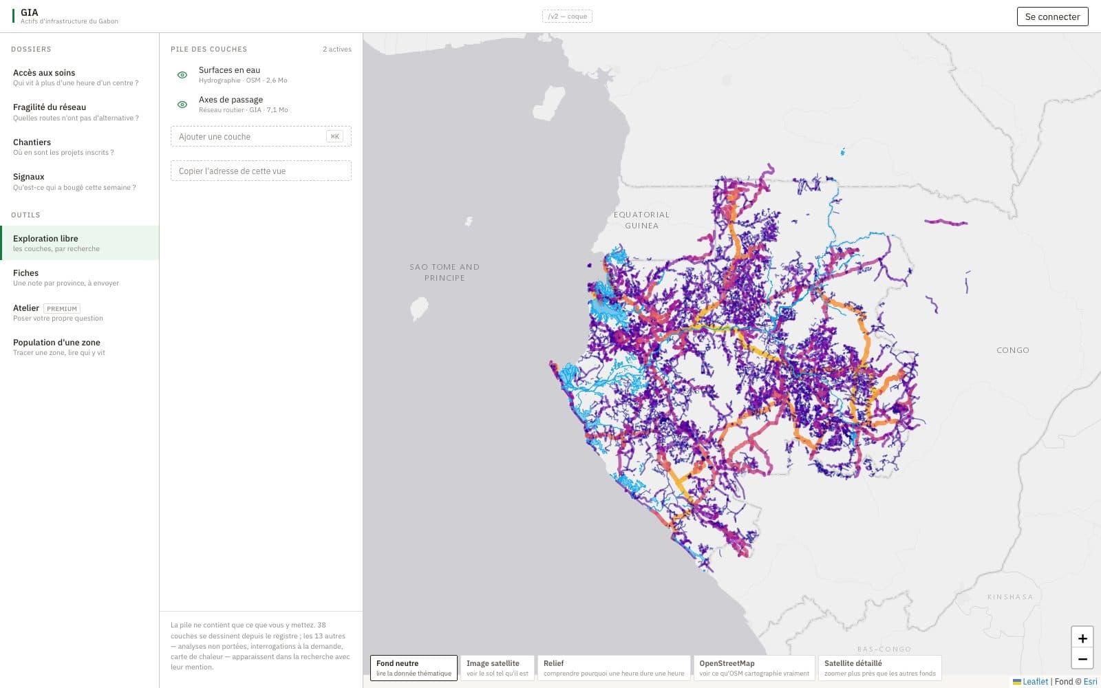 The GIA platform: dossiers and a layer stack beside a map of Gabon with roads coloured by load